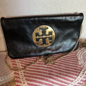 Tory Burch Reva fold-over leather clutch w chain prominent gold-tone logo emblem